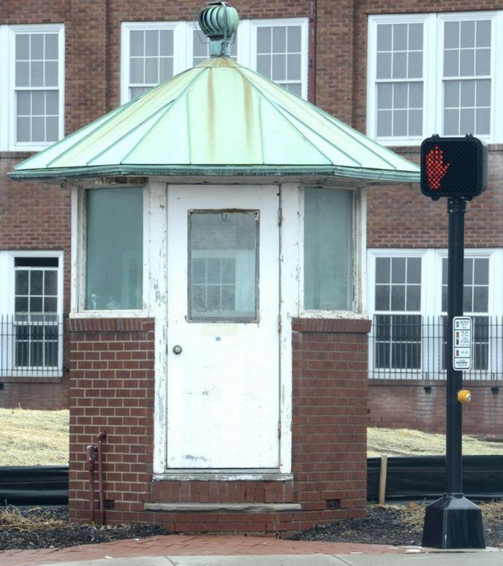 The hexagonal North Canton Police Booth at its original location at the intersection of Main and Maple Streets.