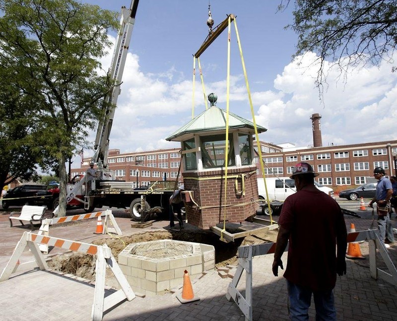 The restored police booth was relocated across the street in 2015.
