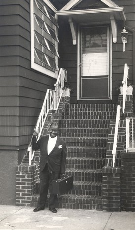 Armstrong in front of his home