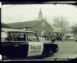 Crowds of people gathering at Shiloh Baptist Church to hear Dr. Martin Luther King Jr. speak.