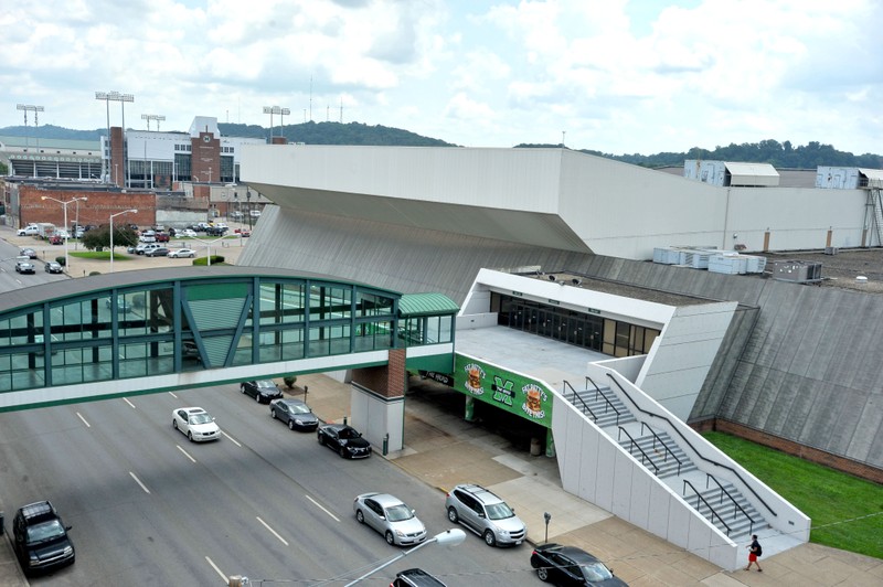 The northern side of the center has an enclosed street bridge to a parking garage.