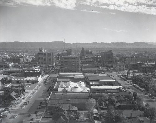 View of South Phoenix from Westward Hotel in 1930. The A.E. England Motor building at the time was in the area of the white tents to the right side. Image courtesy of ASU Library Digital Depository, McCulloch Bros. Inc. photographs (1884-1947).