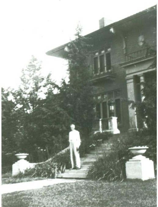 Frederick A. Anton on front steps of Anton-Woodring House in 1930 photo (KSHS)