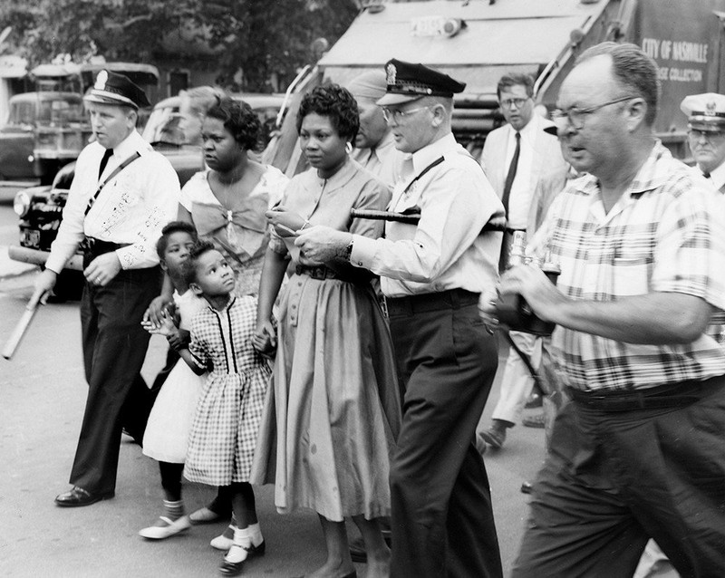 Police walking parents with their children to Fehr Elementary in Nashville, Tennessee on the first day of school. 