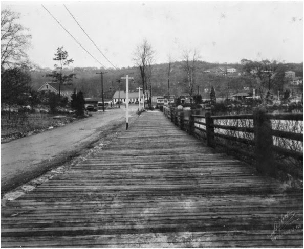 A Park View facing the old Larson's restaurant on North Main Street from the park's boardwalk where Save-A-Lot once stood. November 1937. Mattatuck Museum, collection.