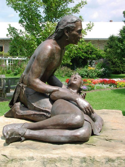 Designed by popular local artist Ross Straight, the sculpture depicts Buckongahelas holding his son Mahonegon, who is dying from a bullet wound to the abdomen. Image obtained from Ross Straight, Artist website.