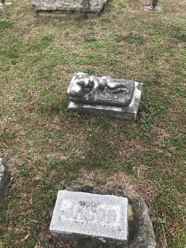 Grave of her son, Jacob Hatcher, located near the base of the statue