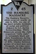 This marker interprets the event as a "massacre" and offers context. It is not on public display here owing to fears of vandalism by those who prefer the memorization of Meriwether 