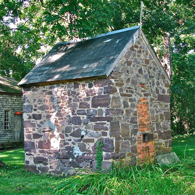 The stone smokehouse dates to c. 1850.