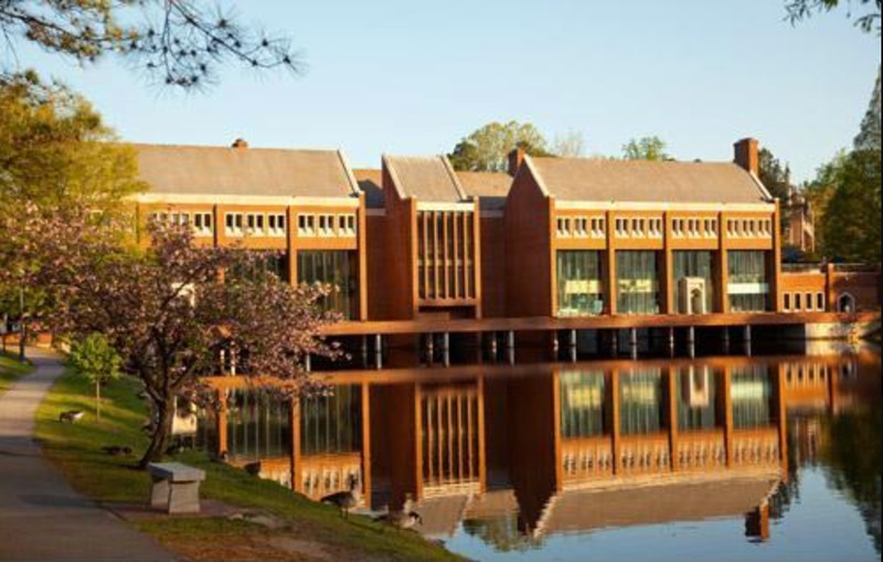 Front view of the Tyler Haynes Commons, overlooking the Westhampton Lake. This building serves as a bridge between the two sides of campus, Westhampton and Richmond College. 