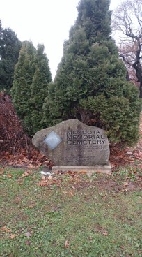 Stone monument which marks the location of the cemetery.