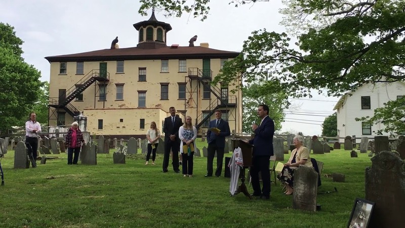 Bacon Academy Principal Matthew Peel during the Founder’s Day Celebration at the gravesite of Pierpont Bacon at the rear of the Old Bacon Academy building in 2018.