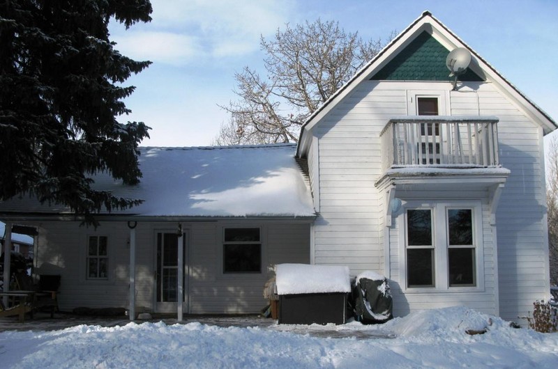 Edworthy residence, on the left is the original log cabin, and the right is an addition added in 1896