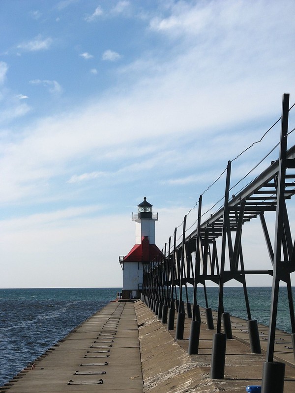 The catwalk was built to allow safe passage in the between the lights and to shore during bad weather.