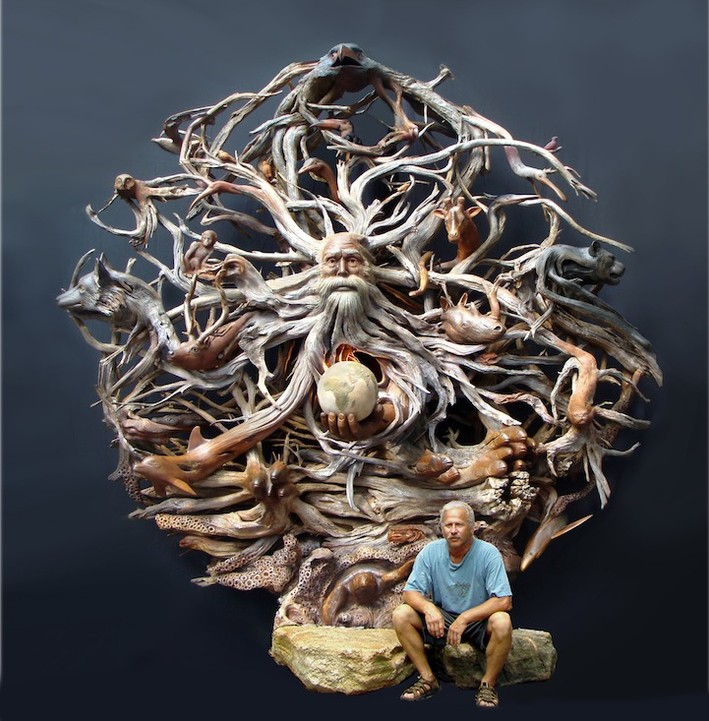 A Matter of Time, carved from cedar driftwood, and sculptor Paul Baliker. Credit: HotSpot Media
