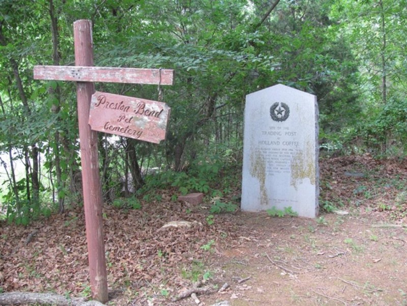 The site of Coffee Trading Post today and the cemetery sign for Preston, and where Holland is buried.