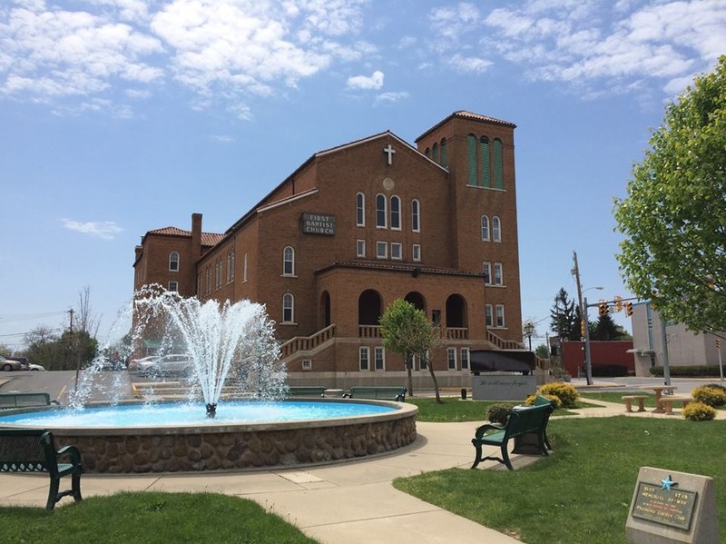 The current sanctuary was built in 1929 and features a four-story bell tower. Image obtained from the Beckley First Baptist Church. 