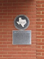 The Texas Historical land marker for the lodge facing Fannin St. This was given to the lodge in 1985