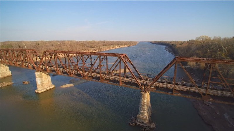 The reason for its flood-proof design becomes quickly apparent when viewing the bridge from above, it sits not far from a major river roughly two hundred feet across.