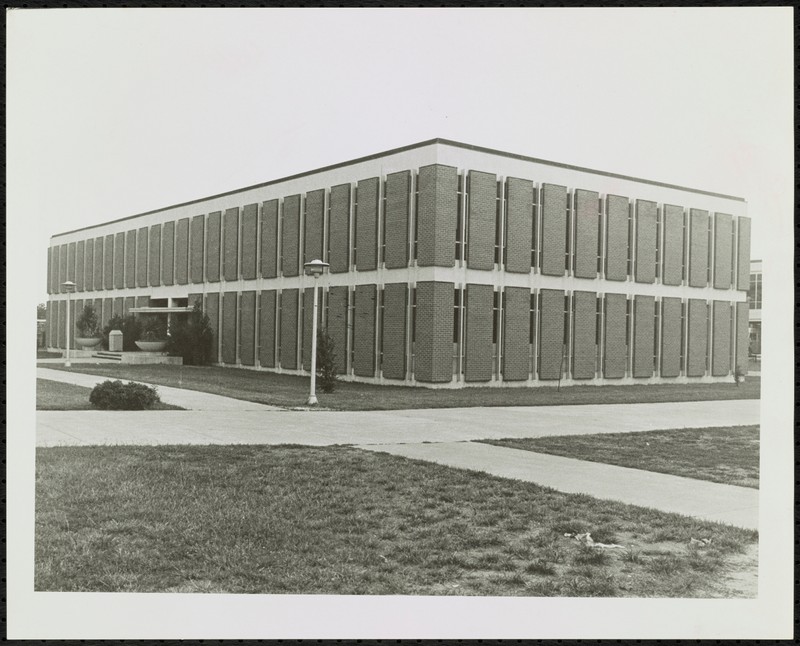 Macy Building, circa 1960s-1970s. View of the building at an angle, black & white photograph.