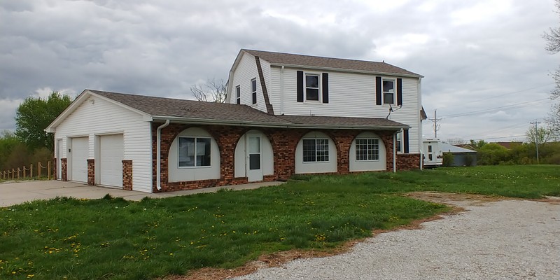 Front view of the house. There are no definitive plans on what will be done with it but there have been discussions about renovations. Aside from the garage, the house itself serves no significant purpose for the barn's current use as an event venue. Photo taken May 6, 2020.