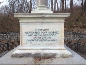 Inscription on one side of the pedestal 