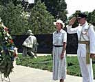 "A Canadian officer salutes after placing a wreath at the Korean War Veterans Memorial in Washington. Representatives of the 22 UN allies who fought in the Korean War participated in the ceremony." (Photo by Rudi Williams) 