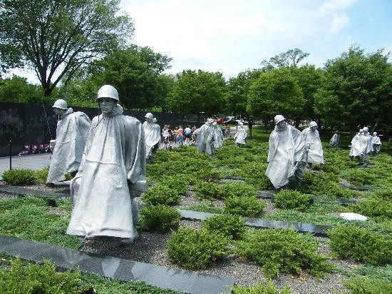 This is an image of the 19 stainless steel statutes sculpted by Frank Gaylord that are a part of the Korean War Veterans Memorial. These statues represent 14 Army soldiers, 3 Marines, 1 member of the Navy, and 1 member of the Air Force. 