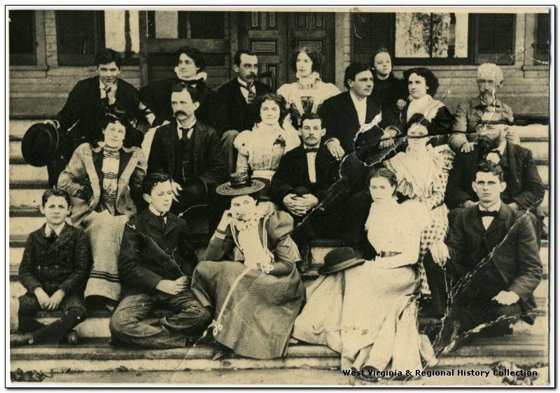 Group picture on the steps of Hull Hotel, circa 1890s to early 1900s. 