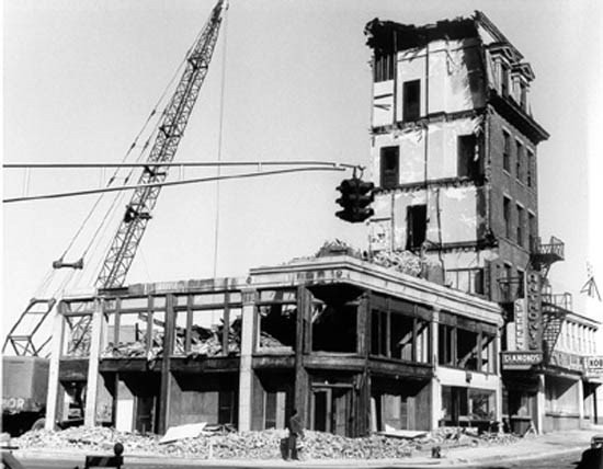 The demolition of the Boardman Building making room for a new parking garage.