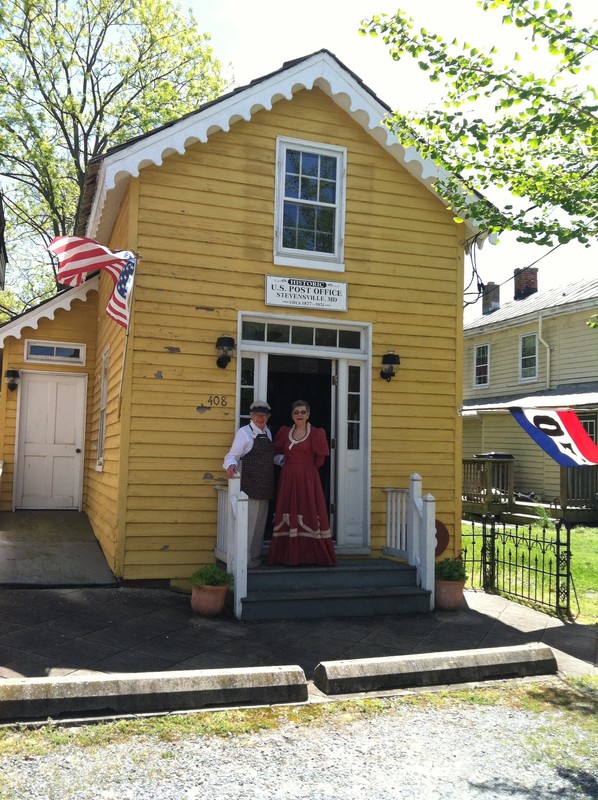 Fran Peters and Nancy Cook, docents, on the steps of the Old Stevensville Post Office