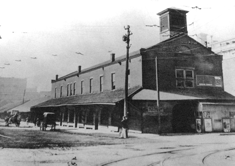 A turn-of-the-century view of the former town market which at that time also included a restaurant. Image from the Wheeling Public Library. 