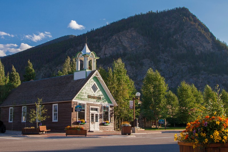 The Frisco Schoolhouse on the corner of Main Street and Second Avenue. The schoolhouse is the center piece of the Frisco Historic Park & Museum and is listed on the National Register of Historic Places.