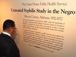 A visitor to the museum reads about they syphilis study.