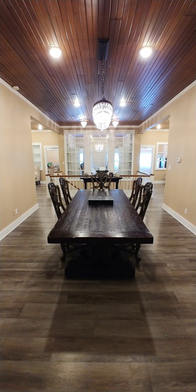 This area is used by the bridal party to prepare for the wedding. It's located on the second floor and separated from the hayloft by large, repurposed church doors. Before renovations in 2015, this was being used as an apartment. Photo taken May 6, 2020.