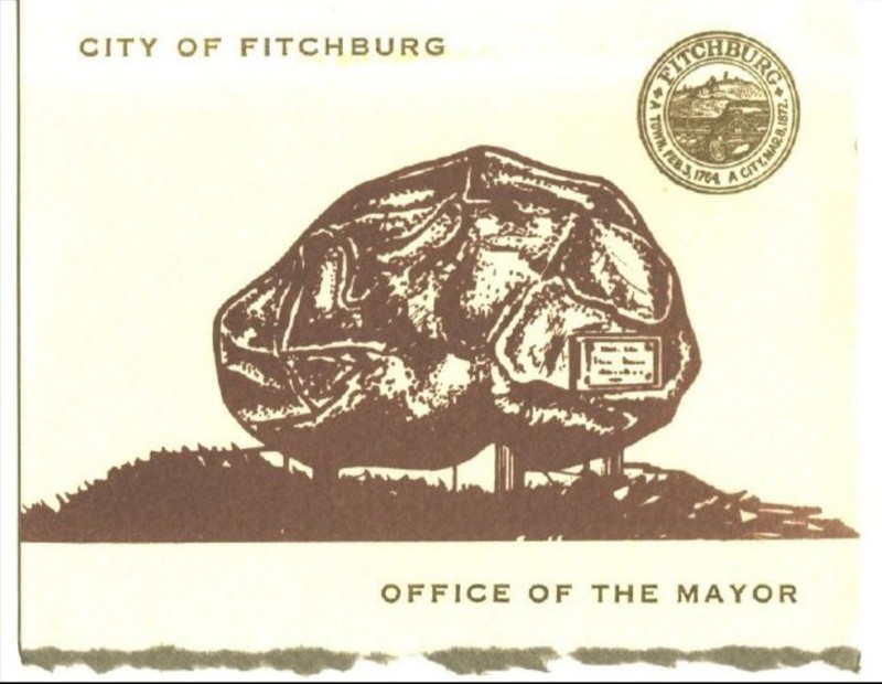 A Christmas card that features a drawing of the Rollstone Boulder that contains its plaque in front of it.