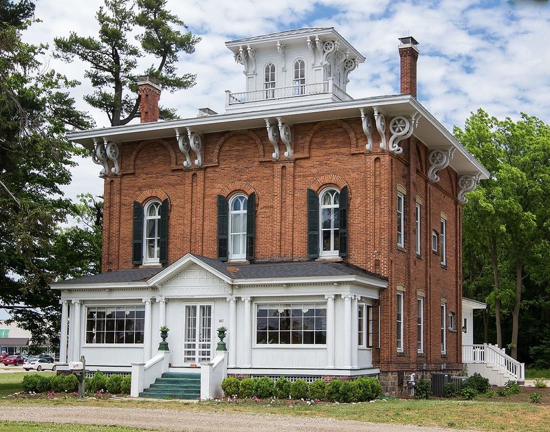 The Abram C. Fisk House was built in 1863 and is today the location of Blue Hat Coffee.