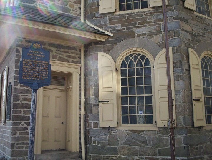 A close up of the Judge's Bay, which was added in 1744 and the historical marker that tells a brief history of the courthouse.  