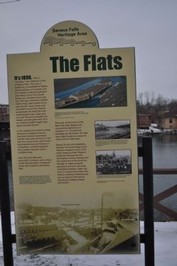 The historical marker is located along the canal where The Flats area once was.