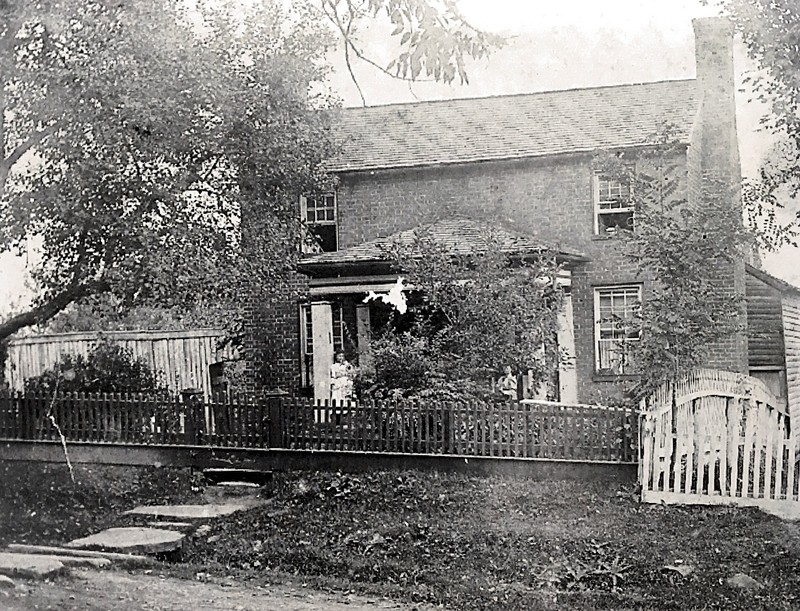 Photo of house before the additions. Courtesy of Greenbrier Historical Society. Date unknown.