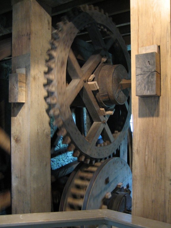 The massive wooden gears that were turned by the waterwheel to power the pumps. 