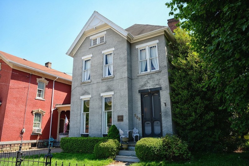 The rather ordinary Edward G. Acheson House sits among similar homes along Main Street. Notice the historic plaque to the left of the front door.