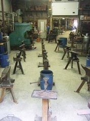 Anvils lined up within the Center for Metal Arts' school.