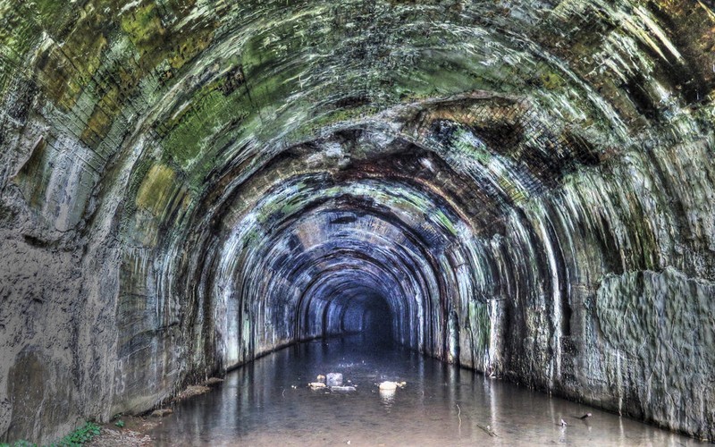 This shows the inside of the deserted tunnel in which it was flooded due to the fact it has been out of operations for nine years now.