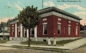 The post office building shown in this postcard is now City Hall at 55 West Maiden Street.