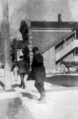 Looking north along Main toward Third Street, south elevation of Rollin Sprague building in background, 1916.