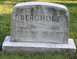 Gravestone saying "Bergholz: Charles F, 1856-1909; Louisa F, 1865-1947.