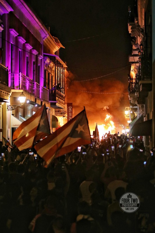 Puerto Ricans protesting in outrage becasue of the governor's behavior