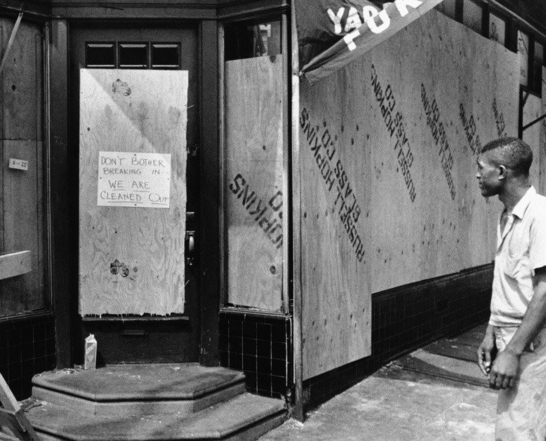 A store boarded up in the aftermath of the rioting