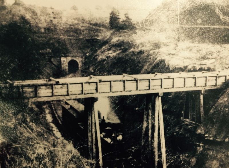 Photo showing a Marietta and Cincinnati Railroad locomotive after exiting the western portal of the Vanderwarker Tunnel.